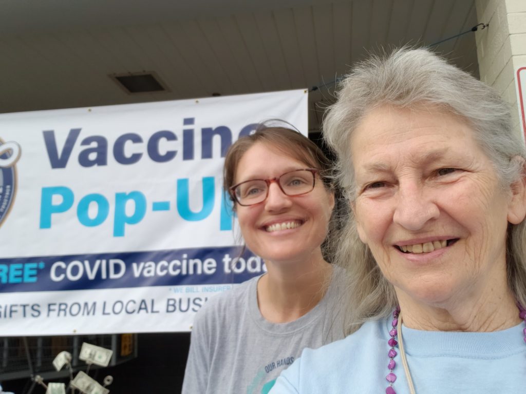 Megan and friend at vaccine pop-up event